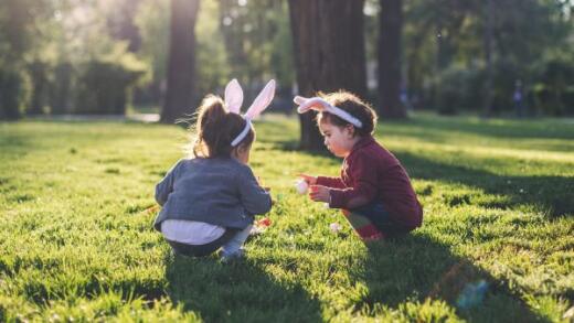 2 girls looking for easter eggs