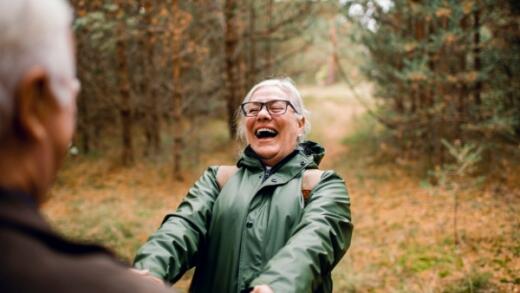 Lady smiling in the autumn forest