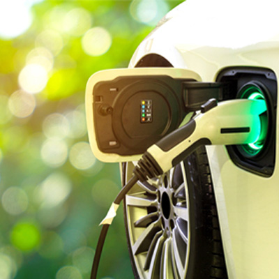 Electric car charger plugged in