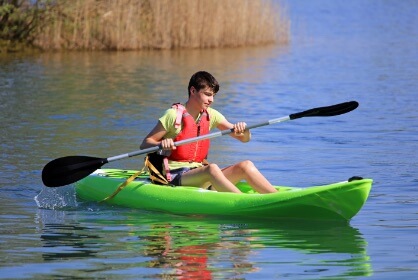 Boy canoeing in Cotswold Waterpark