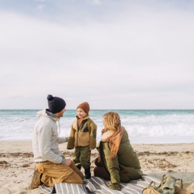 Family on the beach in winter