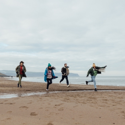 friends walking on the beach