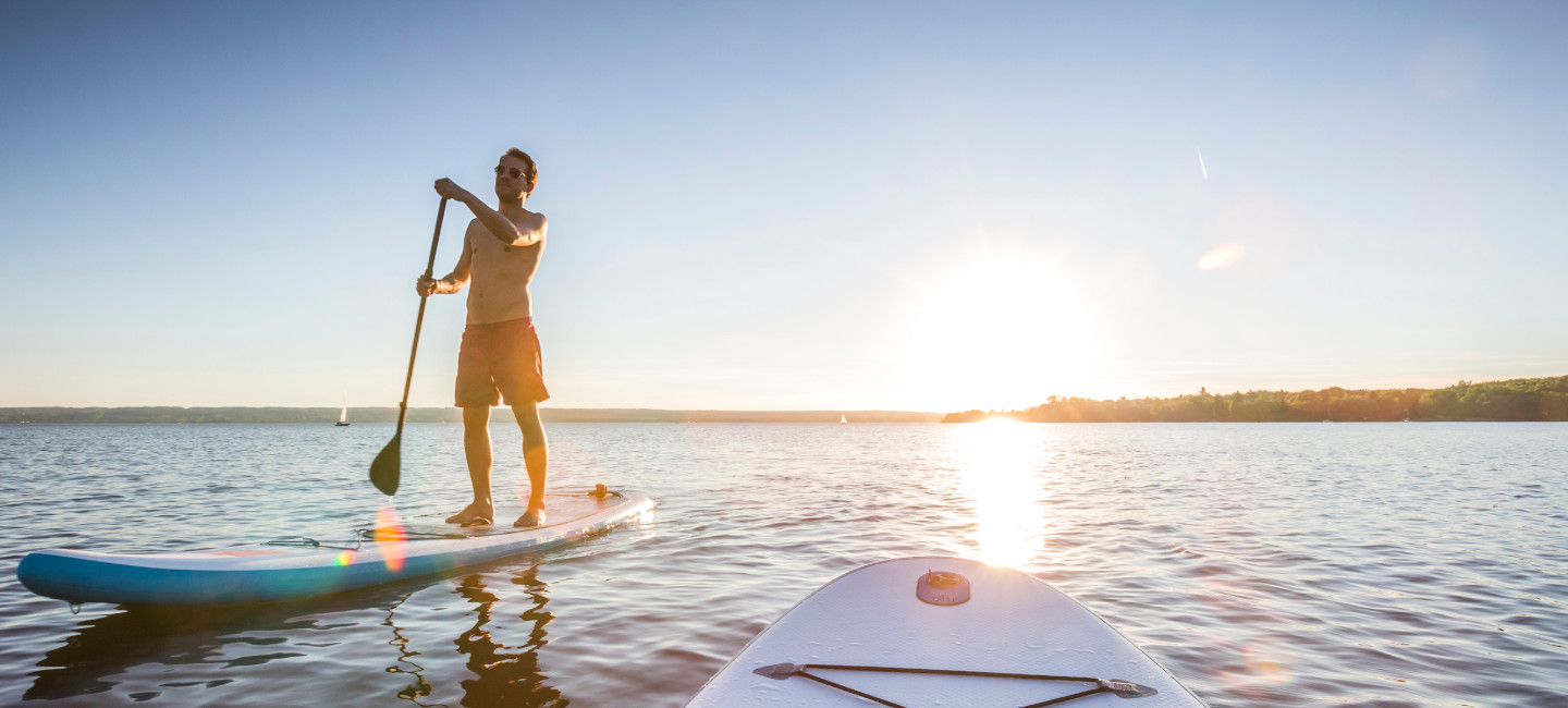paddle boarder 1440x651