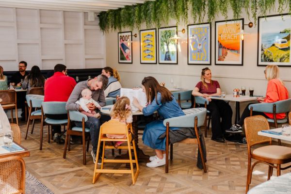 families enjoying The Compass restaurant