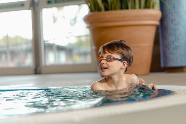 Boy in indoor pool