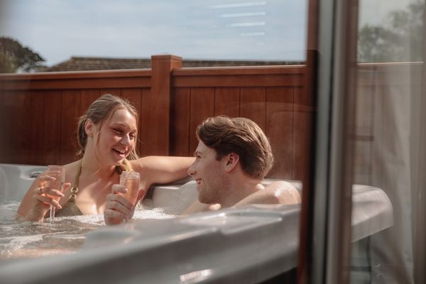 Couple enjoying hot tub