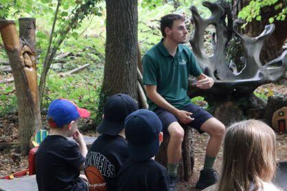 Woodland education group with young children in the forest
