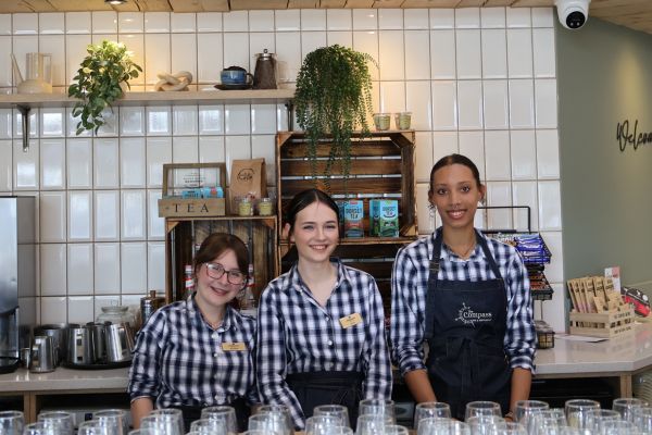 Happy employees at the compass